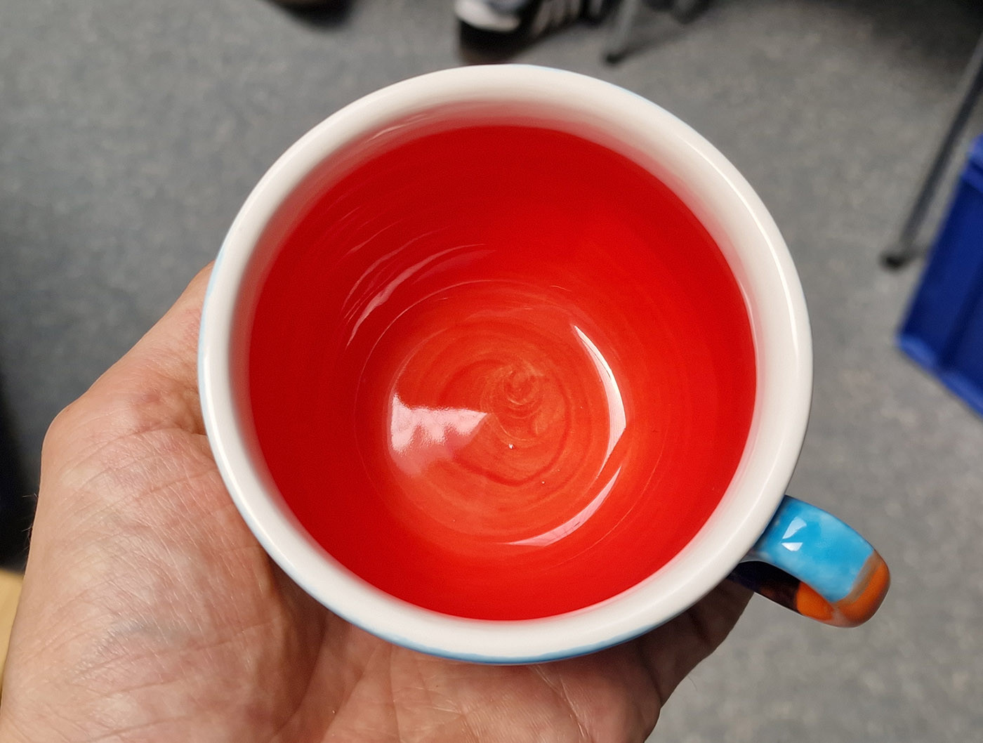 Photo of the inside of the cup, which is quite red.