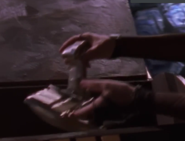 prop that appears to be a painted joystick, with visible cooliehat knobs and butttons