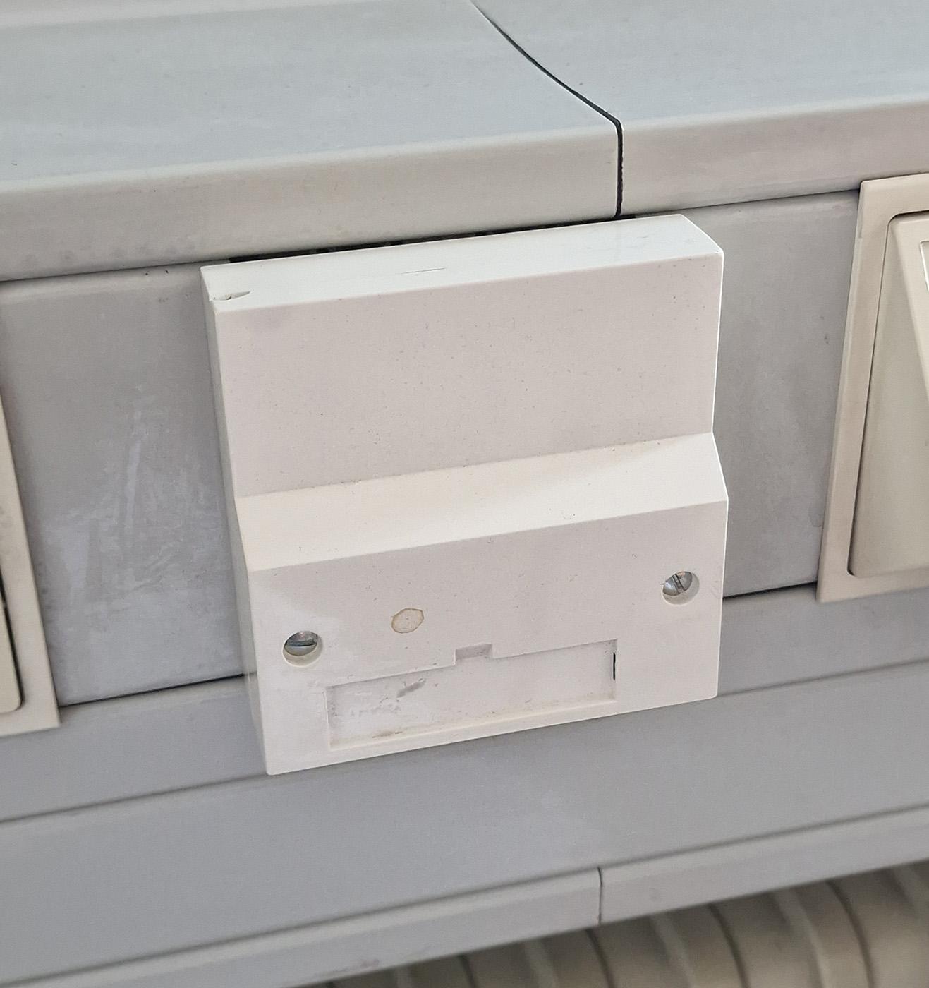 Photo of the re-mounted box, ready for the use it will probably never see. I ended up cleaning off that stain and printing a new adhesive label to put in the slot, as the clear plastic that used to hold the designation has also gone missing.